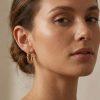 Boucles d’oreilles « Alice » en acier inoxydable dorée. Design torsadé