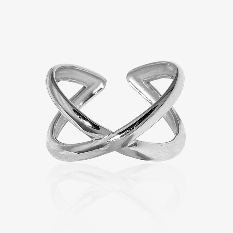Bague croisée en acier inoxydable argenté, design moderne et minimaliste pour femme