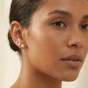 6 puces d’oreilles en acier inoxydable doré, sublimées par de délicates perles blanches