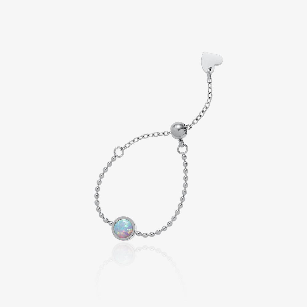 Bracelet argenté en acier inoxydable avec pierre style opale irisée, bijou élégant et ajustable pour femme