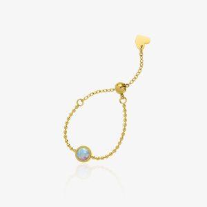 Bracelet doré en acier inoxydable avec pierre style opale irisée, bijou élégant et ajustable pour femme
