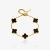 Bracelet trèfle porte-bonheur doré en acier inoxydable avec pendentifs noirs, bijou chic et symbolique pour femme