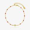 Bracelet doré en acier inoxydable avec perles rouges et croix centrale, bijou raffiné au style spirituel pour femme